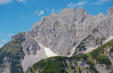 Tirol Mountain Chain with a small shed place on the rocks