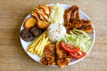 Chicken wings barbeque in a dish with BBQ grill sauce . Izgara tavuk kelebek sis kanat. Tavuk sis, gogus.