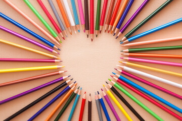 Heart shape in color pencils with copy space, colorful abstract card with love concept	
