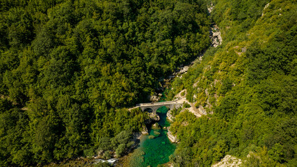 Fototapeta premium aerial view Danilov Most stone Bridge with clear blue water Mrtvica River