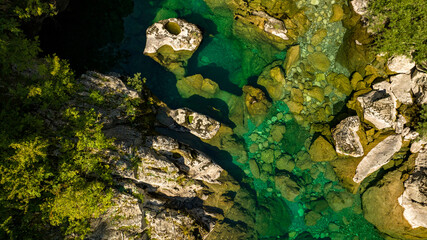  crystal clear blue water of mrtvica river in canyon