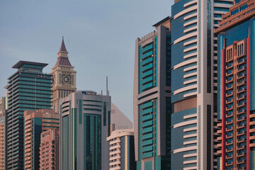 Close-up of tall and modern office and apartment buildings along Sheikh Zayed Road from Al Wasl in the urban city of Dubai, United Arab Emirates.