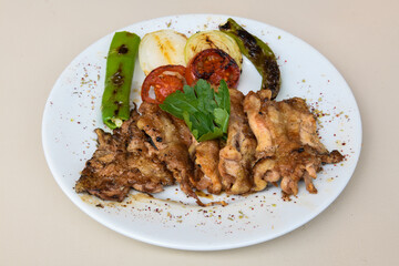 Chicken wings barbeque in a dish with BBQ grill sauce . Izgara tavuk kelebek sis kanat. Tavuk sis, gogus.