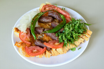 Meatball between bread (Turkish name : ekmek arasi kofte ) Izgara kofte. Manisa, Akcaabat, Akhisar  kofte