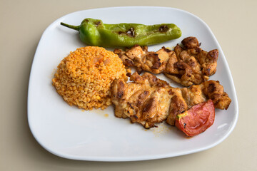 Chicken wings barbeque in a dish with BBQ grill sauce . Izgara tavuk kelebek sis kanat. Tavuk sis, gogus.