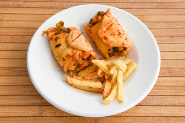Lavash doner kebab ( doner zurna durum )  or shawarma sliced in plate isolated. 