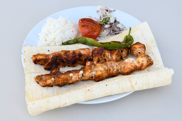 Chicken wings barbeque in a dish with BBQ grill sauce . Izgara tavuk kelebek sis kanat. Tavuk sis, gogus.