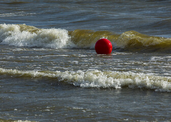 red ball on the beach