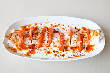 Meat, chicken shawarma kebab with yogurt and fried butter sauce .Tantuni Special. Yogurtlu et , tavuk tantuni.