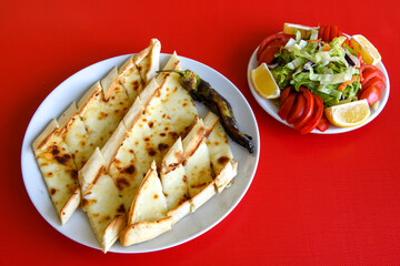 Turkish pita with minced cubed meat and cheese (Turkish name: Kiyma Kusbasi kasarli pide)