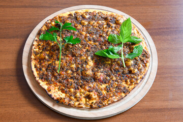 Turkish pita with minced cubed meat and cheese (Turkish name: Kiyma Kusbasi kasarli pide)