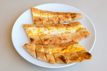 Turkish pita with minced cubed meat and cheese (Turkish name: Kiyma Kusbasi kasarli pide)