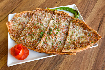 Turkish pita with minced cubed meat and cheese (Turkish name: Kiyma Kusbasi kasarli pide)