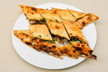 Turkish pita with minced cubed meat and cheese (Turkish name: Kiyma Kusbasi kasarli pide)