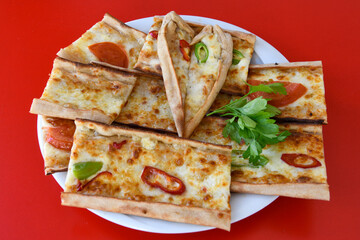 Turkish pita with minced cubed meat and cheese (Turkish name: Kiyma Kusbasi kasarli pide)
