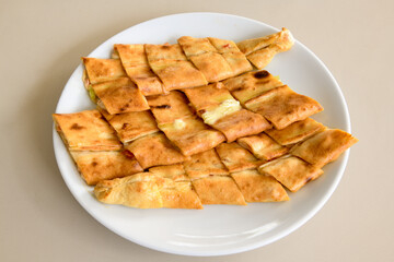 Turkish pita with minced cubed meat and cheese (Turkish name: Kiyma Kusbasi kasarli pide)