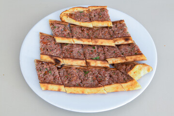Turkish pita with minced cubed meat and cheese (Turkish name: Kiyma Kusbasi kasarli pide)