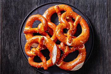 soft pretzels baked in the form of knot - obrazy, fototapety, plakaty