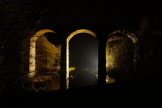 Glenluce viaduct over the river Luce in Scotland in the dark at night