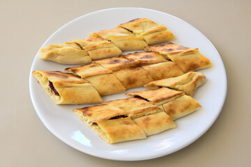 Turkish pita with minced cubed meat and cheese (Turkish name: Kiyma Kusbasi kasarli pide)