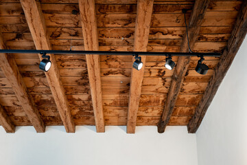 light fixtures in a wooden ceiling