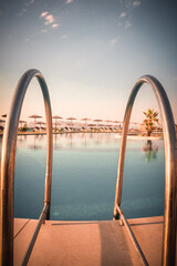 Obraz na płótnie Canvas Pool at the Astir Odysseus Hotel in July 2022.
