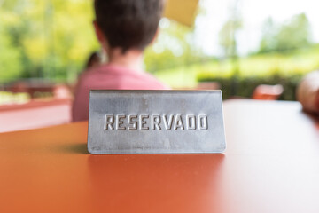 reservation sign above a table in a restaurant