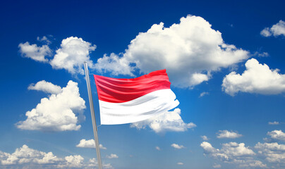 Indonesia national flag cloth fabric waving on the sky - Image