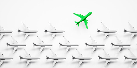 Group of white airplanes with green leader on white background - green energy travel concept - 3D illustration