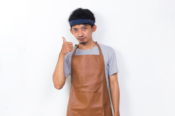 funny apron man smiling happy with ok sign gesture tumb up isolated on white background
