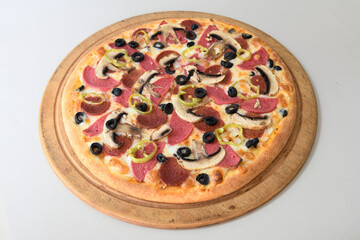 Delicious mixed pizza with rich content. Menu concept of choice and diversity