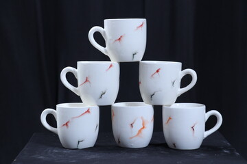 Many cup black background.