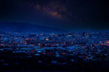 Fototapeta premium View on the night city on a starry sky background 