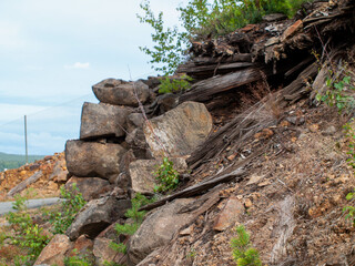 Ruined old wooden structure in post apocalyptic landscape Falu Copper Mine World Heritage Sweden