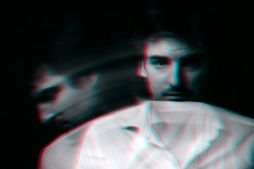 Abstract blurry portrait of a schizophrenic man with mental disorders and bipolar split...
