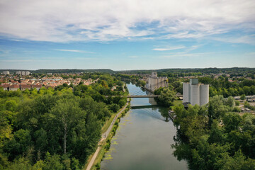 Fototapeta na wymiar aerial view on the river the loing and the Charles Hochart bridge on the city of Nemours