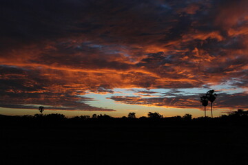 orange sky and clouds as the sun goes down