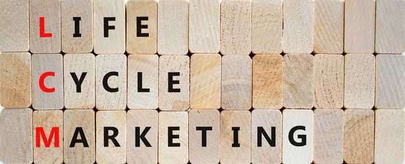 LCM lifecycle marketing symbol. Concept words LCM lifecycle marketing on wooden blocks on a beautiful wooden background. Business and LCM lifecycle marketing concept. Copy space.