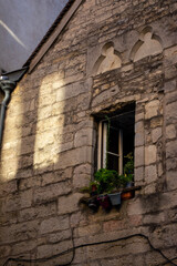 Fototapeta na wymiar old wall with a lonely window