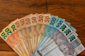 Brazilian money in the form of a fan on the table