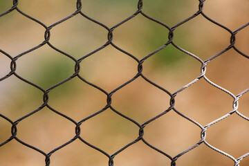 Fototapeta premium Stainless steel chain link fence mesh for high security enclosures.