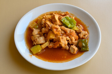 Sauteed chicken with carrots and peas ( Turkish ; Et, Tavuk Sote, guvec  )