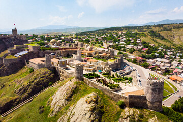 Fototapeta na wymiar Aerial fly over Akhaltsikhe Castle in Georgia. This is a medieval fortress built in the IX century