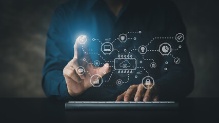 Businessmen tap on the hologram icon online data network connection, uploading data to the cloud so that the data can be transferred to other devices and can be viewed online at any time.