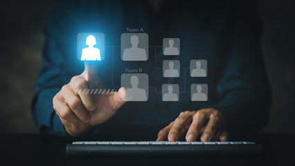 Businessman wearing formal suit pointing to company recruitment icon hologram, analysis and development solution, efficient recruitment concept, young recruitment. in startup companies.