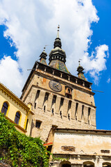 Fototapeta na wymiar Medieval fortified citadel of Sighisoara city and the famous Clock Tower