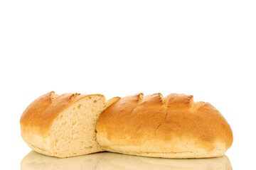 Two halves of a fragrant fresh long loaf, close-up, isolated on a white background.