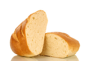Two halves of a fragrant fresh long loaf, close-up, isolated on a white background.