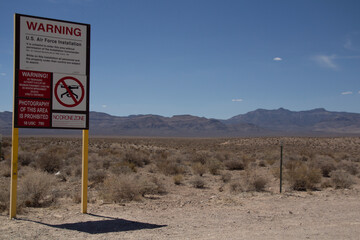 Area 51 Warning Keep Out Sign with Copy Space in the Blue Sky in Southern Nevada