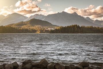 lake and mountains during sunset